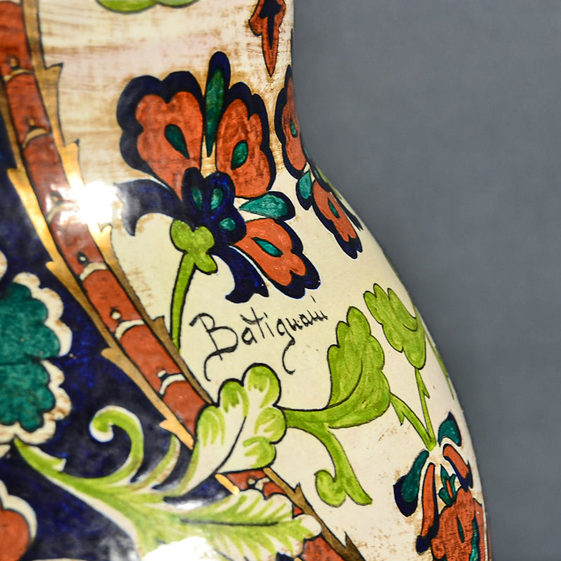 Vaso in terracotta dipinta con elementi vegetali e floreali f.to Batignani. Manifattura fiorentina. Metà ‘900