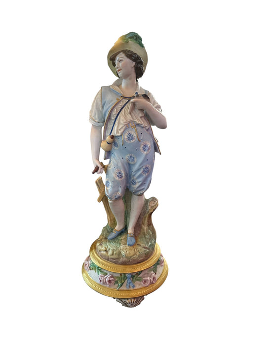 Statuetta in porcellana dipinta a mano raffigurante "Giovane" inizi '900