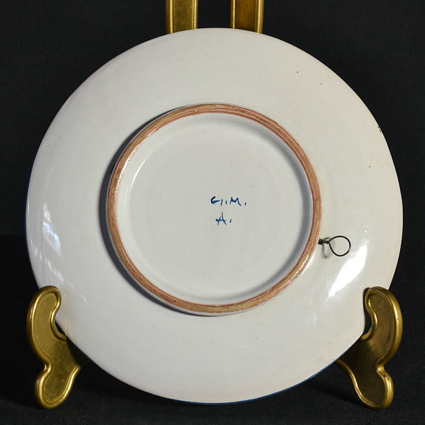 Piatto in maiolica blu e bianca. Italia. Epoca ‘900